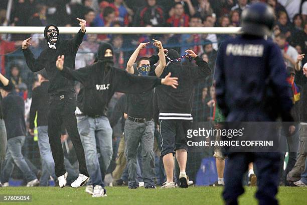Basel suppporters invade the pitch after FC Zurich won 2 to 1 over FC Basel and is Swiss football champion during the last day of the 2005-2006 Swiss...