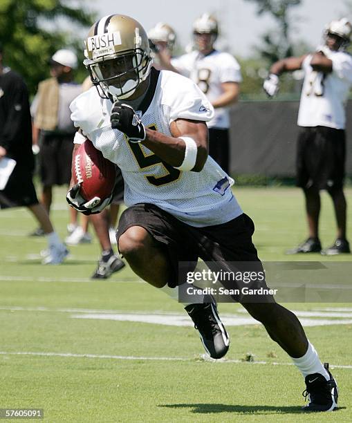 Rookie running back Reggie Bush of the New Orleans Saints practices during Rookie Camp on May 13, 2006 at the Saints Training Facility in Metairie,...