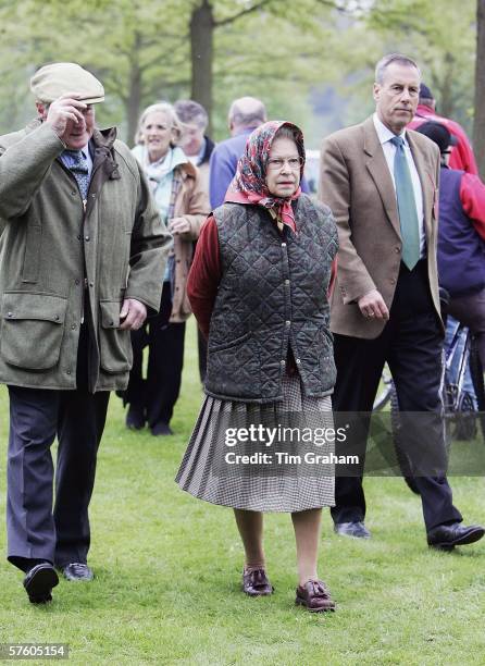 Queen Elizabeth II in quilted jacket and silk headscarf at the Royal Windsor Horse Show, Windsor Great Park in the grounds of Windsor Castle on May...