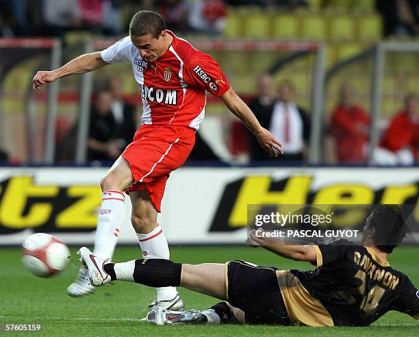 Monaco's Uruguayan midfielder Diego Perez is challenged by Nancy's French midfielder Benjamin Gavanon during their French L1 football match Monaco vs...