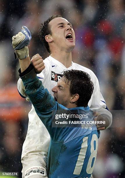 Zurich's Steve Von Bergen celebrates with goalkeeper Johnny Leoni their team won 2 to 1 over FC Basel and is the new Swiss football champion, during...