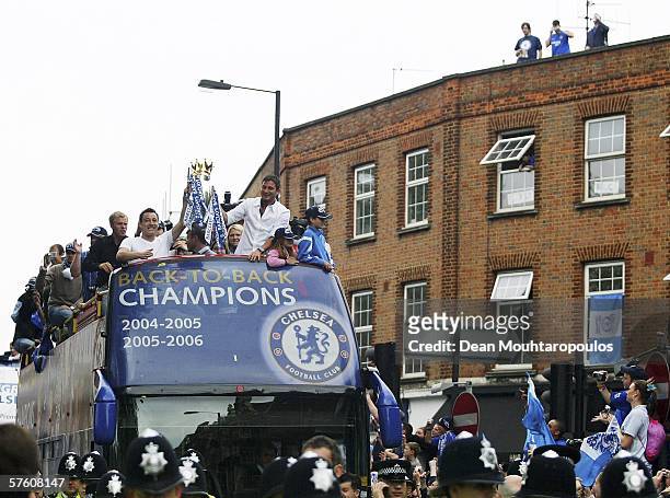John Terry and Frank Lampard lead the celebrations as they show the Premiership Trophy to the fans on the open-topped bus parade of the Barclays...