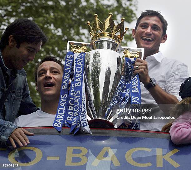 John Terry and Frank Lampard show the Premiership Trophy to the fans on the open-topped bus parade of the Barclays Premiership trophy and the FA...