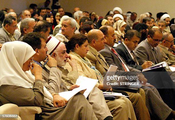 Iraqi members of Parliament attend a session 14 may 2006 in the heavily fortified Green Zone area in Baghdad. Iraqi prime minister designate Nuri...