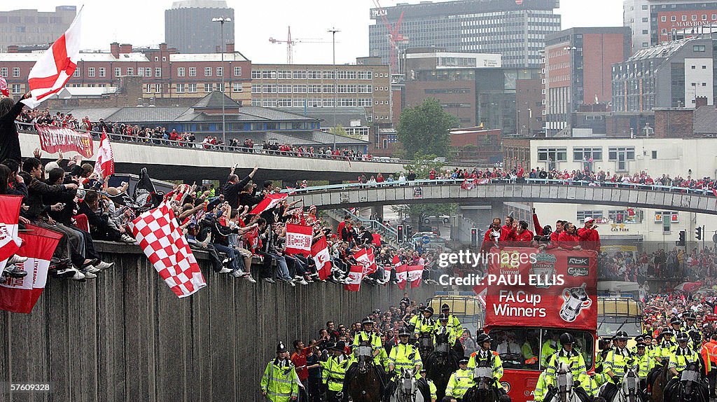 Liverpool players parade with The Englis