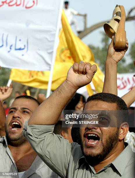 Iraqis loyal to Shiite Grand Ayatollah Ali al-Sistani demonstrate in the southern city of Basra, 14 May 2006 to protest against the regional...