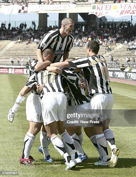 The Juventus team celebrate David Trezeguet of Juventus scoring a goal during the match between Reggina and Juventus at the Stadio Granillo on May...