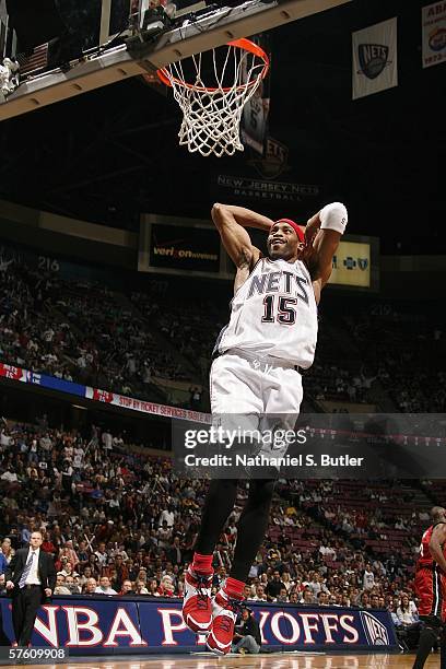 Vince Carter of the New Jersey Nets dunks against the Miami Heat in game four of the Eastern Conference Semifinals during the 2006 NBA Playoffs on...