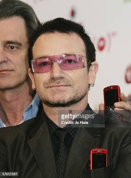 S frontman, Bono, launches the red version of the new Motorola SLVR phone at the Carphone Warehouse, Oxford Street on May 15, 2006 in London,...