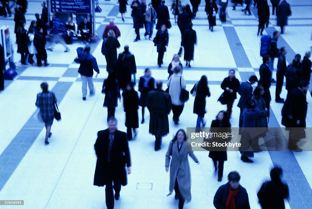 Elevated view of people walking in a building