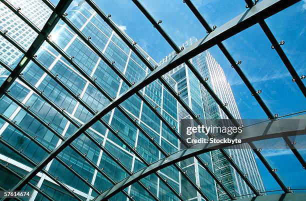 low angle view of a high rise office building - office skyscraper stock pictures, royalty-free photos & images