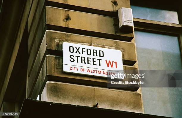an oxford street sign on the side of a building - oxford street imagens e fotografias de stock