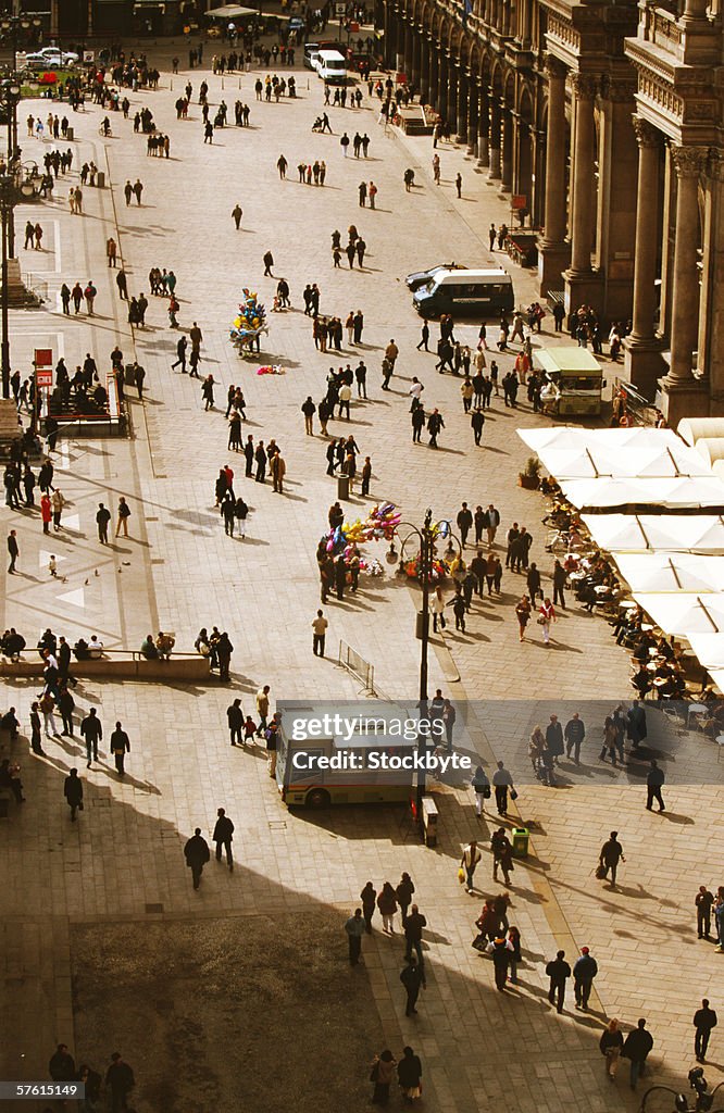 Elevated view of a crowd of people in the street