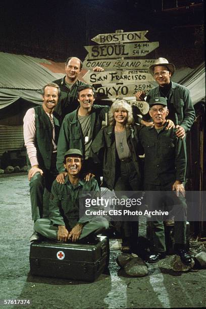 Portrait the cast of the television show 'MASH,' mid- to late-1970s, From left American actors Mike Farrell , David Ogden Stiers , Alan Alda, Jamie...