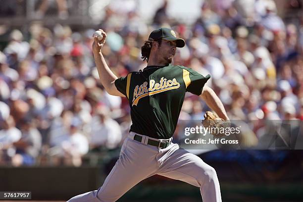 Dan Haren of the Oakland Athleticss pitches against the Chicago Cub during a spring training game at Hohokam Stadium on March 2, 2006 in Mesa,...