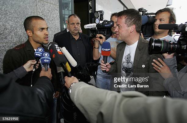 David Odonkor speaks to the press after his arrival at the Steigenberger Airport Hotel on May 16, 2006 in Frankfurt, Germany. The German national...