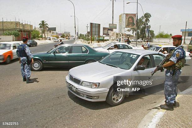 Iraqi policemen patrol the streets of the southern Iraqi city of Basra 16 May 2006. The city has recently seen a rise in violence and tensions as...