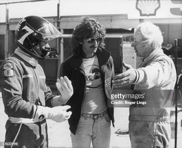 British motorbike champion Barry Sheene at Brands Hatch, where he is driving a Formula One racecar for the first time, 25th April 1978. Also present...