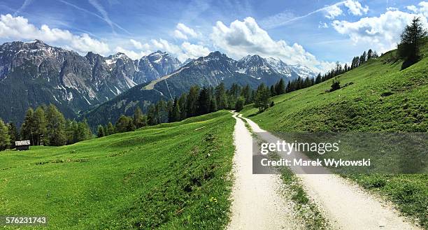 panorama view of stubaital - spring valley road stock pictures, royalty-free photos & images