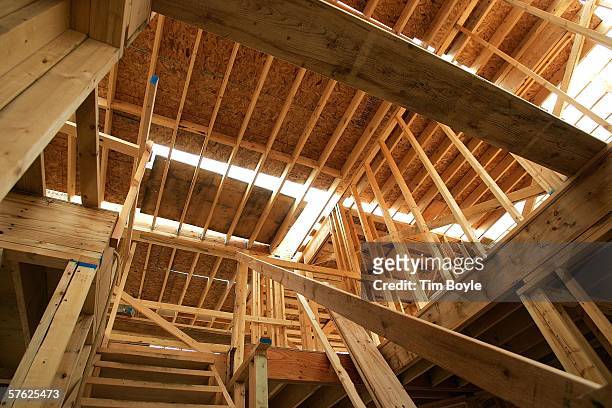 Single-family home under construction is seen from the inside May 16, 2006 in Mount Prospect, Illinois. Housing starts reportedly were down last...
