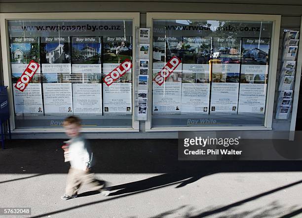 Real estate agent displays its current listings in their shop window May 17, 2006 in Auckland, New Zealand. Despite the recent increase in home...