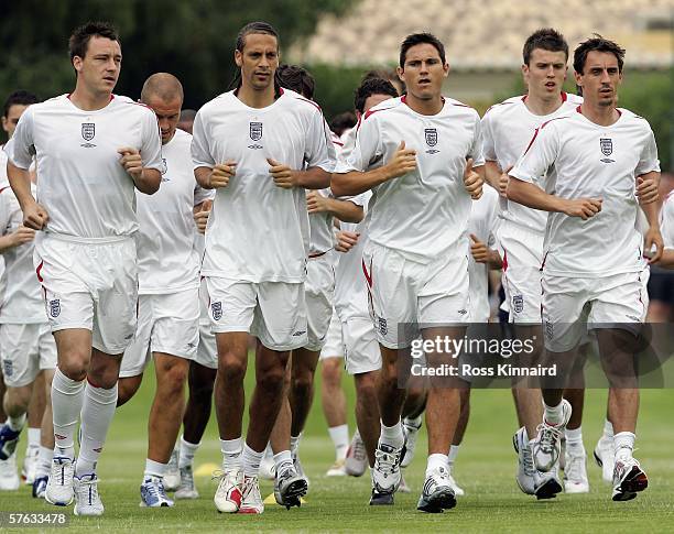 John Terry, Rio Ferdinand, Frank Lampard and Gary Neville of England are put through their paces during the squads pre World Cup training camp at...