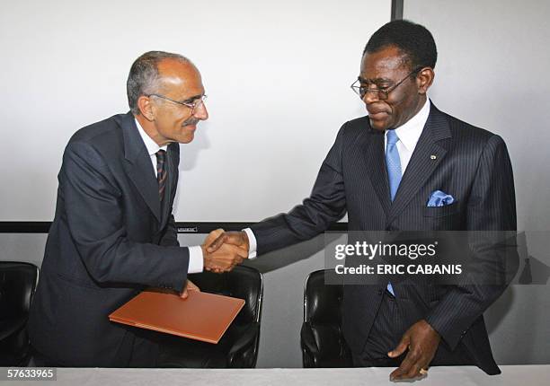 Equatorial Guinea's President Teodoro Obiang Nguema Mbasogo and Filippo Bagnato, chief executive of French and Italian airplane manufacturer ATR,...