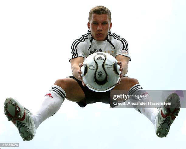 Lukas Podolski of Germany poses with the adidas matchball specifically designed for the Opening Match of the FIFA World Cup 2006 Germany, Germany vs....