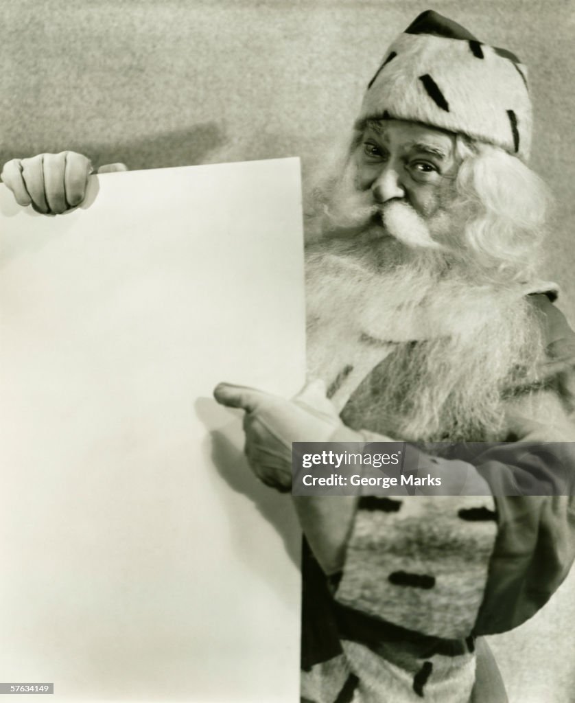 Père Noël tenant vide feuille de papier (B & W), portrait