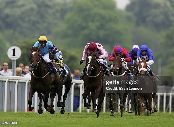 Philip Robinson riding Millville leads the field on his way to winning The Blue Square Stakes race at York Racecourse on May 17 York, England. .