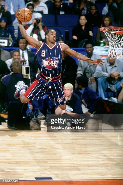 Steve Francis of the Houston Rockets attempts a tomahawk jam as he competes in the 2000 NBA Slam Dunk Contest at the Arena in Oakland on February 12,...