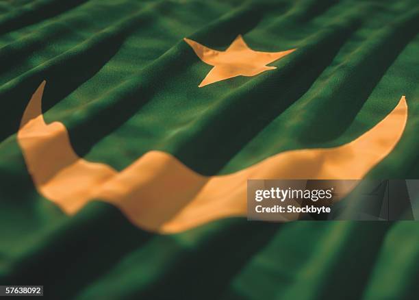 close-up of the flag of mauritania - flag of mauritania stock pictures, royalty-free photos & images