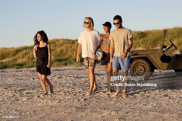 young people walking on beach - car from the top stock pictures, royalty-free photos & images