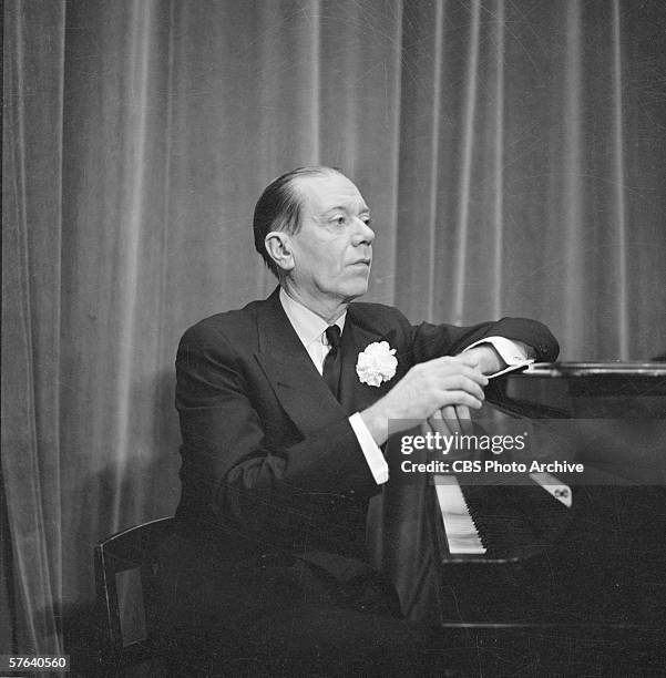 American composer Cole Porter sits at the piano on Ed Sullivan's 'Toast of the Town,' New York, New York, February 24, 1952.