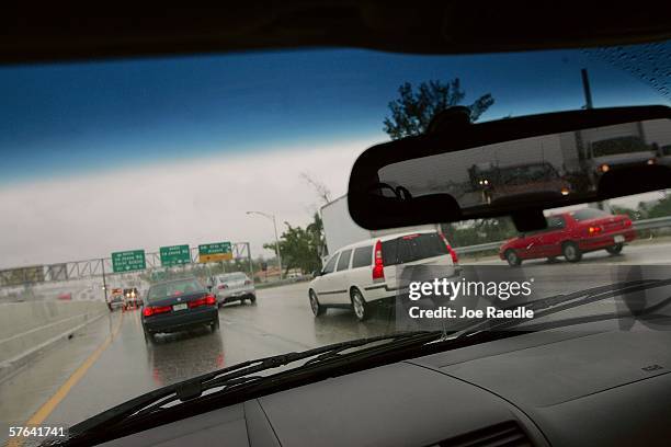 Vehicles drive through the streets May 17, 2006 in Miami, Florida. The Driver?s Seat 2006 AutoVantage Road Rage Survey ranked Miami as the least...