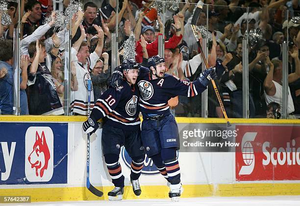 Shawn Horcoff and Ryan Smyth of the Edmonton Oilers celebrate after scoring the second goal against the San Jose Sharks in game six of the Western...