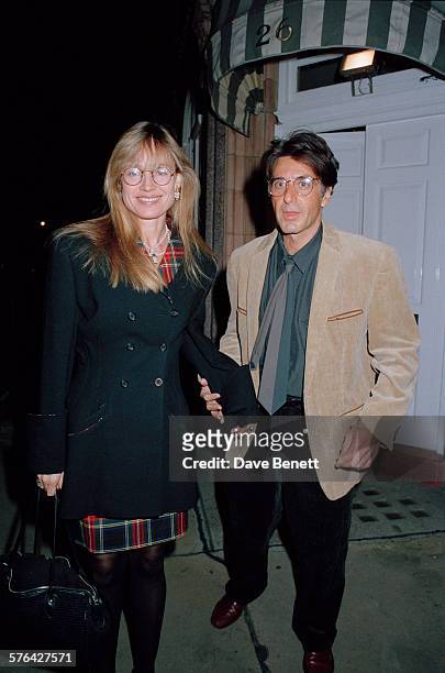 Actor Al Pacino and Australian film director and producer Lyndall Hobbs pose outside Harry's Bar on October 15, 1991 in London, England.