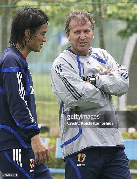 Brazilian Japan coach Zico talks with team captain Tsuneyasu Miyamoto duing the World Cup training camp at the J-Village May 18, 2006 in Fukushima,...