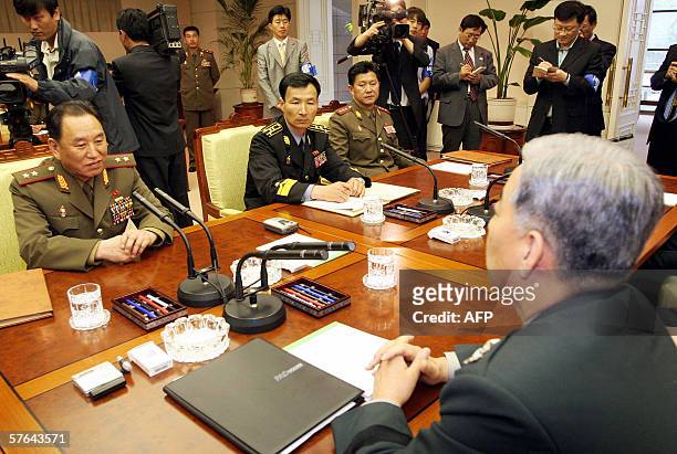 South Korea's Major General Han Min-Koo and North Korea's Lieutenant General Kim Yong-Chol hold discussions during the third and final day of...