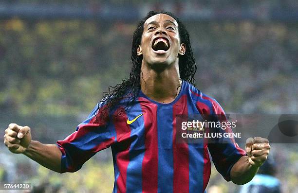 Barcelona's Brazilian forward Ronaldinho celebrates after winning the UEFA Champion's League final football match against Arsenal, 17 May 2006 at the...