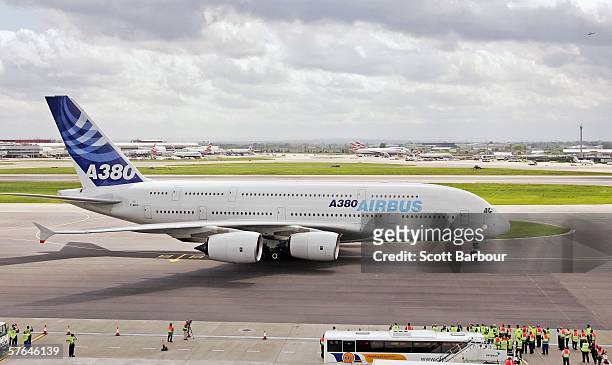 An Airbus A380, the world's largest passenger aircraft comes into the terminal after landing for the first time at Heathrow Airport on May 18, 2006...