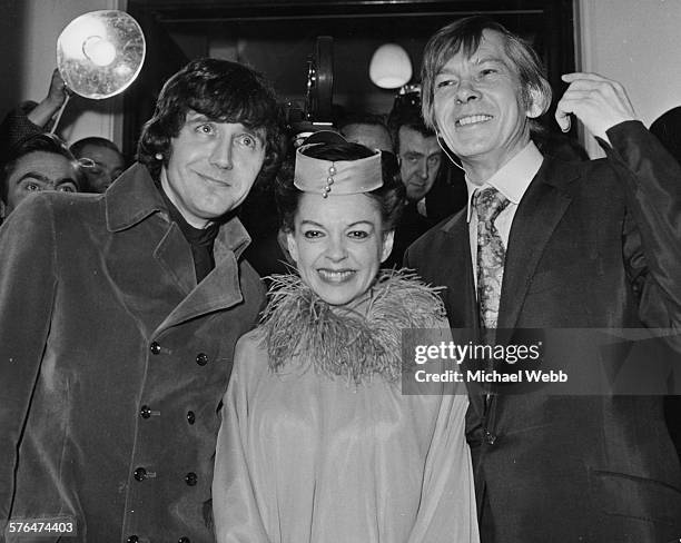 American singer and actress, Judy Garland pictured together with her new husband Mickey Deans and his best man, singer Johnny Ray outside Chelsea...