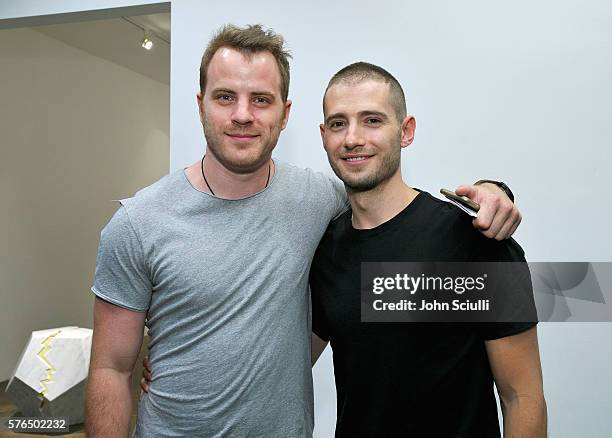 Actor Robert Kazinsky and Julian Morris attend Landon Ross: ARTIfACT exhibition opening at LAXART on July 14, 2016 in Los Angeles, California.