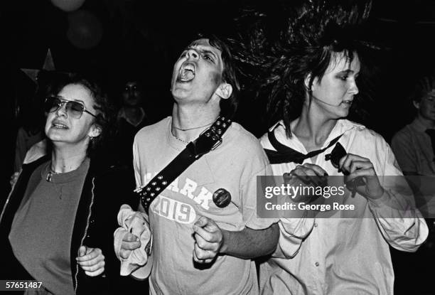 Punk fans dance to the music during a 1979 Black Flag concert at the Elk's Club in downtown Los Angeles, California.