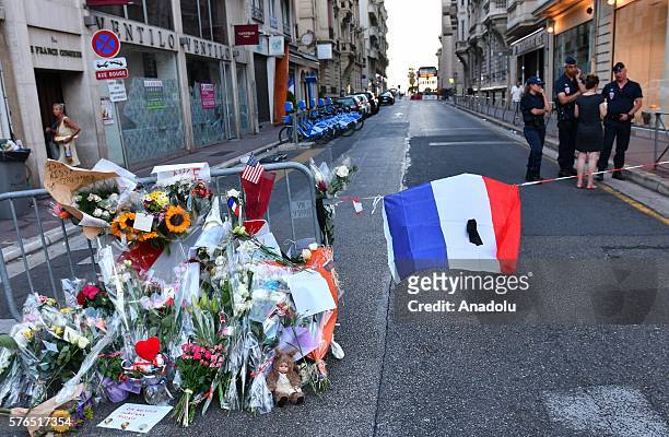 People leave flowers to various places of the city for the victims of the Nice terror attack, in Nice, France on July 15, 2016.