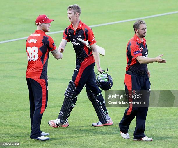 Phil Mustard of Durham and Ben Stokes congratulate team-mate Keaton Jennings on the victory during the NatWest T20 Blast game between Durham Jets and...
