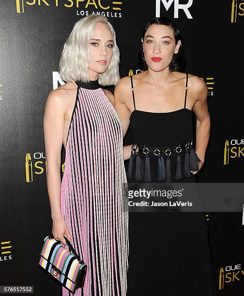 Violinist Margot and DJ Mia Moretti of The Dolls attend the launch of OUE Skyspace LA at U.S. Bank Tower on July 14, 2016 in Los Angeles, California.