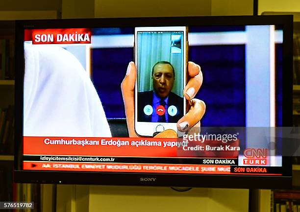 Turkish President Recep Tayyip Erdogan speaks on CNNTurk via a Facetime call in the early morning hours of July 16, 2016 in Istanbul, Turkey....