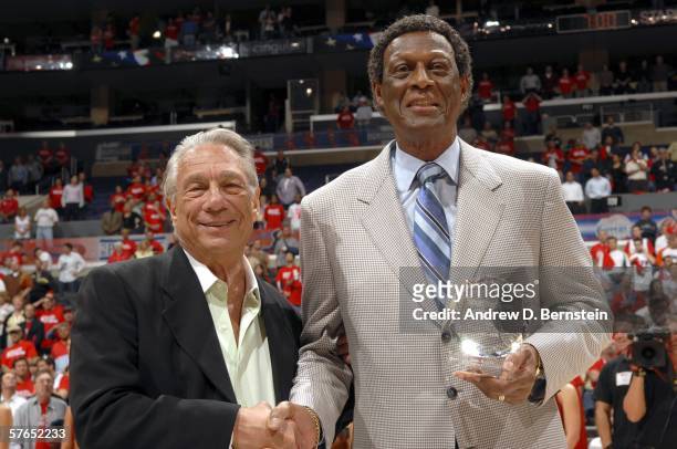 Elgin Baylor , the Los Angeles Clippers vice president of basketball operations, accepts the NBA Executive of the Year award by the Sporting News...