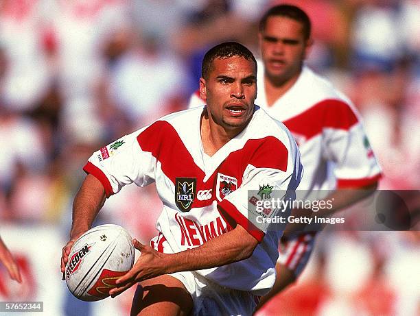 Anthony Mundine of the Dragons looks to offload the ball during a NRL finals match between the St George Dragons and the Canterbury Bulldogs at...